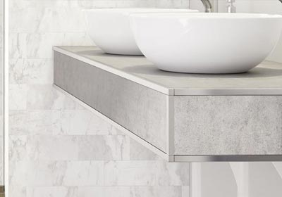 Door threshold strip installed between two flooring types during renovation