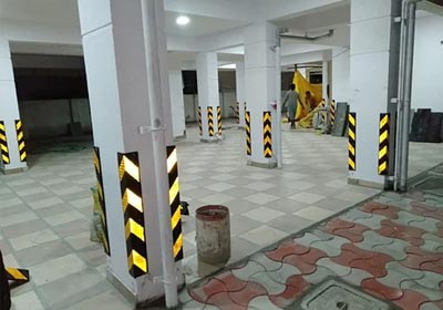 Wall corner protector preventing scratches and dents in a busy commercial hallway