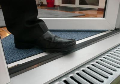 Customer browsing a wide range of quality door thresholds on a specialist UK website